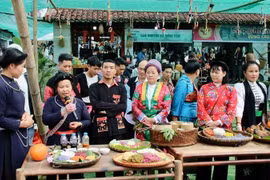 Una muestra gastronómica en la Aldea de Cultura y Turismo de las Nacionalidades de Vietnam. (Foto: Nhan Dan)