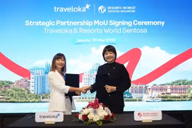 Se espera que la colaboración recién suscrita entre Traveloka y Resorts World Sentosa ayude a estrechar las relaciones turísticas entre Vietnam y Singapur. (Foto: Nhan Dan)