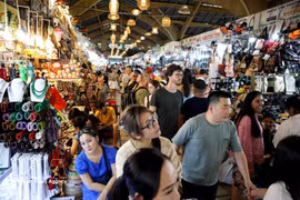 Turistas en Ciudad Ho Chi Minh. (Foto: VNA)