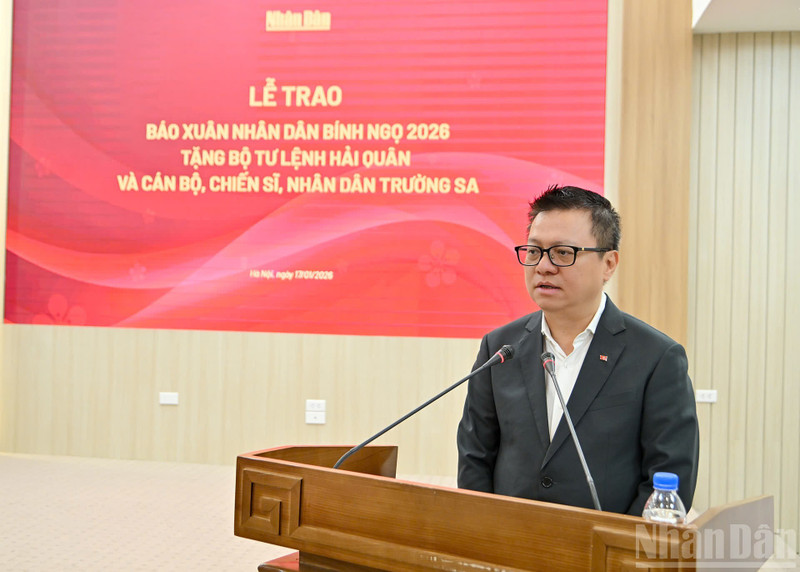 Le Quoc Minh, presidente editor del diario Nhan Dan habla en la cita (Foto: Nhan Dan)