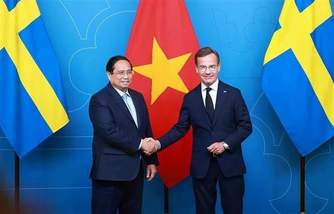 El primer ministro vietnamita, Pham Minh Chinh, y su homólogo sueco, Ulf Kristersson (Foto: VNA)