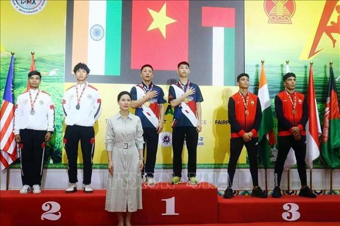 Con un total de 46 medallas, incluidos 14 de oro, 16 de plata y 16 de bronce, el equipo de Vietnam conquista el primer lugar en la clasificación general del Campeonato Asiático de Muay 2025 (Foto: VNA)