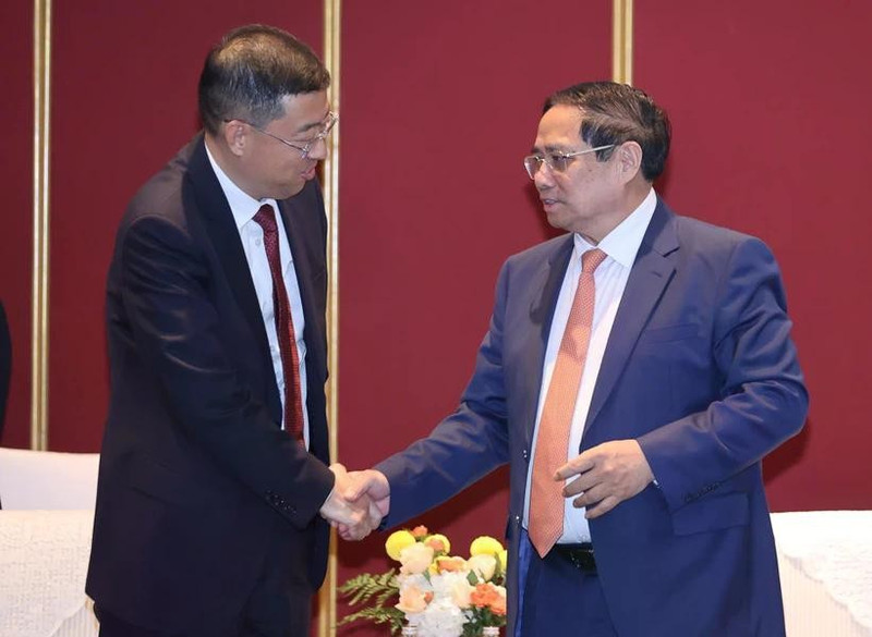 El primer ministro de Vietnam, Pham Minh Chinh, recibe al presidente del Banco de China (BOC), Ge Haijiao. (Foto: VNA)