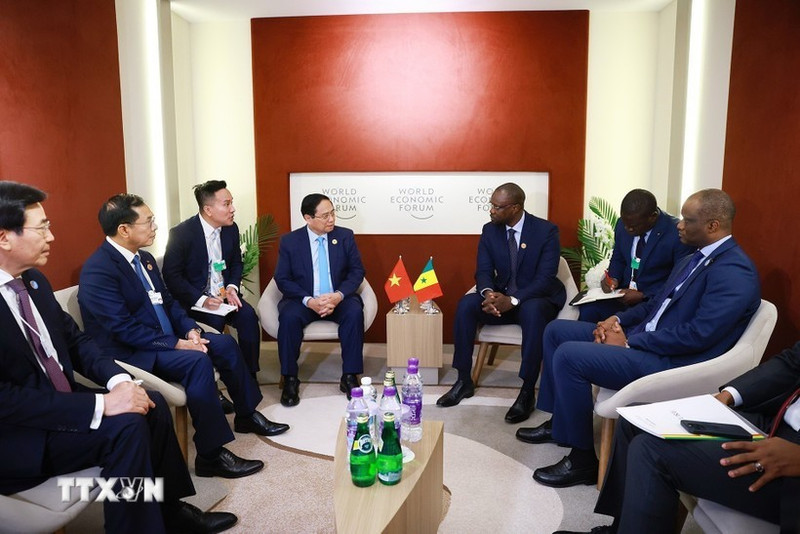 Una reunión entre el primer ministro vietnamita, Pham Minh Chinh, y su homólogo senegalés, Ousmane Sonko (Foto: VNA)