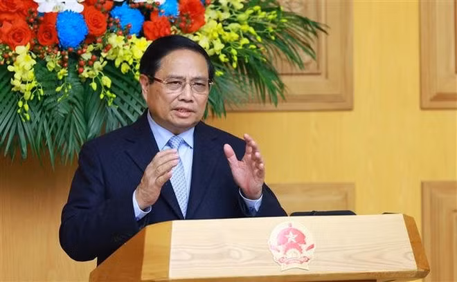 El primer ministro Pham Minh Chinh habla en el seminario con empresas estadounidenses (Foto: VNA)