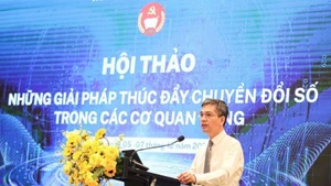 Vo Thanh Hung, subjefe de la Oficina del Comité Central del Partido Comunista de Vietnam, habla en la cita. (Foto: Dinh Phuong)