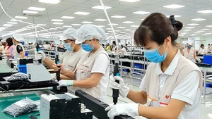 Inversión extranjera impulsa crecimiento económico en múltiples localidades de Vietnam (Foto: Nhan Dan)