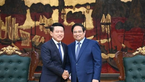 [Foto] Premier vietnamita recibe al jefe de Comisión de Reforma de Empresas del Comité Central del PPRL