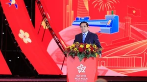 El primer ministro Pham Minh Chinh habla en el evento. (Foto: Nhan Dan)