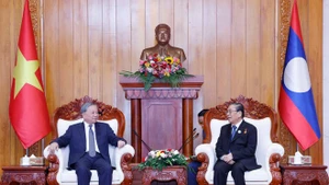 El secretario general del Partido Comunista de Vietnam, To Lam, y el exsecretario general del Partido Popular Revolucionario de Laos y expresidente del país, Choummaly Sayasone. (Foto: VNA)