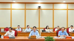 El miembro del Buró Político y presidente del Estado, Luong Cuong, habla en la cita.