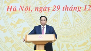 El primer ministro Pham Minh Chinh habla en el evento. (Foto: Nhan Dan)