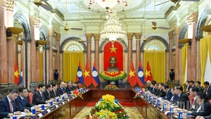 Escena de la reunión. (Foto: Nhan Dan)