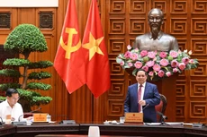 El primer ministro de Vietnam, Pham Minh Chinh, interviene en la reunión.
