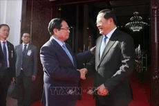 El primer ministro de Vietnam, Pham Minh Chinh, (izquierda) y su homólogo de Laos, Sonexay Siphandone (Foto: VNA)
