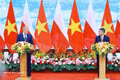 El primer ministro vietnamita, Le Minh Hung, (izquierda) y su homólogo polaco, Donald Tusk. (Fuente: VNA)