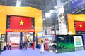 Con un diseño resplandeciente, el pabellón de Vietnam atrae la mirada de quienes visitan la sección internacional de la gran feria.