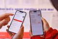 Los pobladores utilizan la aplicación VNeID. (Foto: VNA)