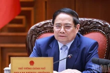 El primer ministro de Vietnam, Pham Minh Chinh, preside la reunión. (Fotografía: Nhan Dan)