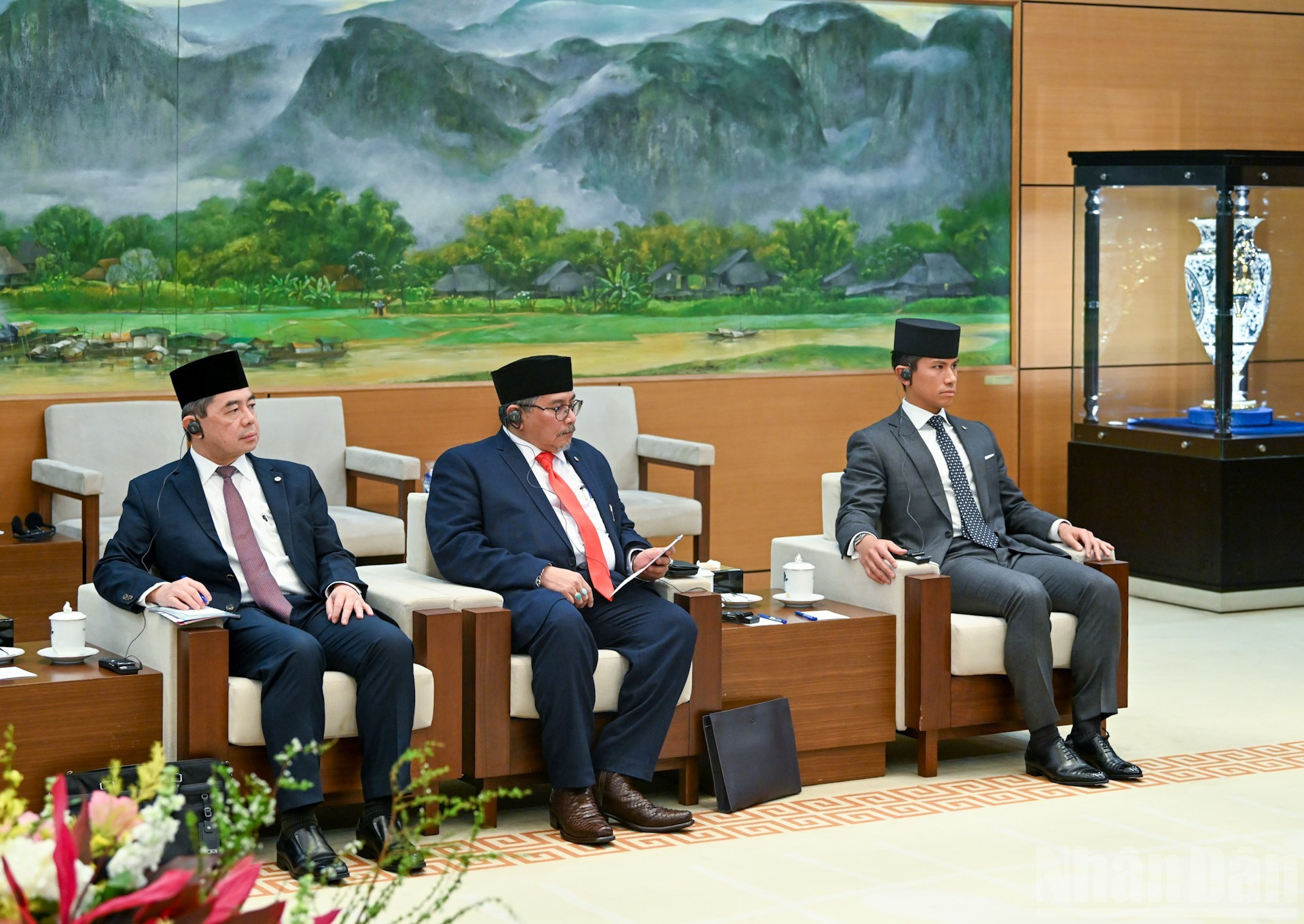 Delegados de Brunéi acuden al encuentro.