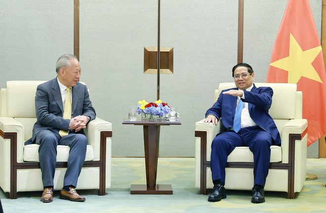 El primer ministro de Vietnam, Pham Minh Chinh, conversa con Yan Jiehe, presidente de CPCG. (Foto: VNA) El primer ministro de Vietnam, Pham Minh Chinh, conversa con Yan Jiehe, presidente de CPCG. (Foto: VNA)