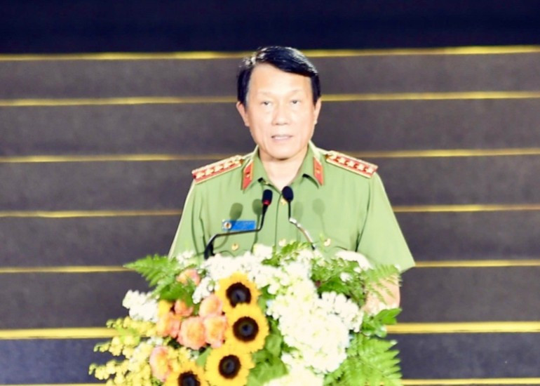 El ministro de Seguridad Pública, Luong Tam Quang, habla en el programa. El ministro de Seguridad Pública, Luong Tam Quang, habla en el programa.