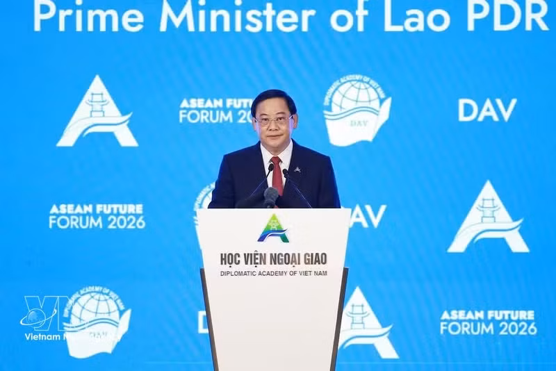 El primer ministro de Laos, Sonexay Siphandone, habla en el evento. (Foto: VNA)