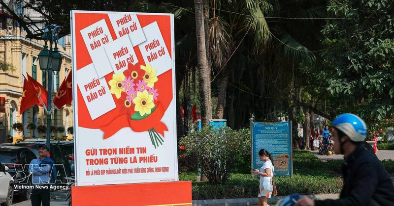 Un cartel para celebrar el día de las elecciones (Foto: VNA)