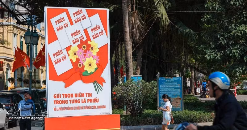 Un cartel para celebrar el día de las elecciones (Foto: VNA)
