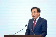 El ministro y portavoz del Gobierno, Tran Van Son, habla en la cita (Foto: VGP)