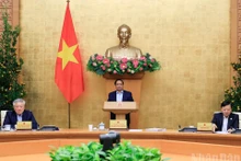 [Foto] Premier vietnamita preside reunión ordinaria del Gobierno correspondiente a febrero