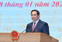 El primer ministro de Vietnam, Pham Minh Chinh, interviene en la cita.(Foto: VNA)