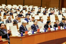 El presidente de la Asamblea Nacional, Tran Thanh Man, asiste a una reunión para informar sobre los resultados del XIV Congreso Nacional del Partido Comunista. (Foto: VNA)