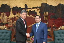 [Foto] Premier vietnamita recibe a delegación de alto rango del Partido de Acción Popular de Singapur 