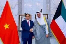El primer ministro de Vietnam, Pham Minh Chinh, y su homólogo kuwaití, Sheikh Ahmad Al-Abdullah Al-Sabah. (Foto: VGP)