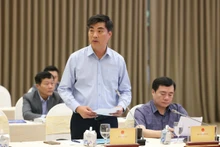 El jefe de la Oficina y portavoz del Ministerio de Construcción, Nguyen Tri Duc, habla en el evento. (Foto: VGP)