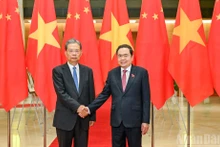 El presidente de la Asamblea Nacional de Vietnam, Tran Thanh Man, y el miembro del Comité Permanente del Buró Político y presidente del Comité Permanente de la Asamblea Popular Nacional de China, Zhao Leji. (Foto: Nhan Dan)