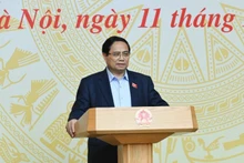 El primer ministro de Vietnam, Pham Minh Chinh, preside la tercera reunión del Comité Directivo Central sobre políticas de vivienda y el mercado inmobiliario. (Foto: Nhan Dan)