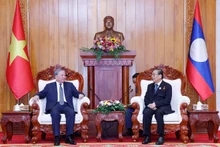 El secretario general del Partido Comunista de Vietnam, To Lam, y el exsecretario general del Partido Popular Revolucionario de Laos y expresidente del país, Choummaly Sayasone. (Foto: VNA)