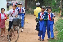 Los niños necesitan tiempo para estudiar y formarse, no para trabajar y ganarse la vida. (Foto: HAI NAM)