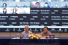 El viceministro de Industria y Comercio, Nguyen Sinh Nhat Tan (derecha), preside la conferencia. (Foto: VNA)