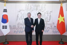El secretario general del Partido Comunista de Vietnam, To Lam, y el presidente de Corea del Sur, Lee Jae Myung. (Foto: VNA)