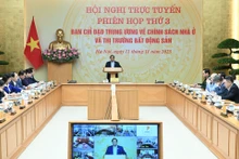 [Foto] Premier vietnamita preside reunión sobre políticas de vivienda y mercado inmobiliario