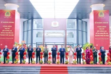 Los delegados inauguran la sede del Ministerio de Seguridad Pública. (Foto: Nhan Dan)