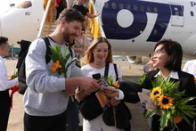 Ceremonia de bienvenida al turista internacional número 20 millones en Vietnam.