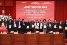 Delegados en el evento (Foto: baochinhphu.vn)