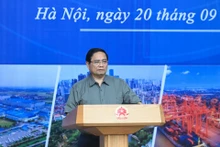 El primer ministro Pham Minh Chinh, habla en la cita. (Foto: Nhan Dan)