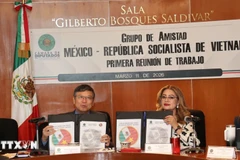 Ceremonia de firma de la agenda de cooperación parlamentaria Vietnam-México (Foto: VNA)