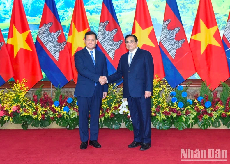 Minh Chinh y Hun Manet.