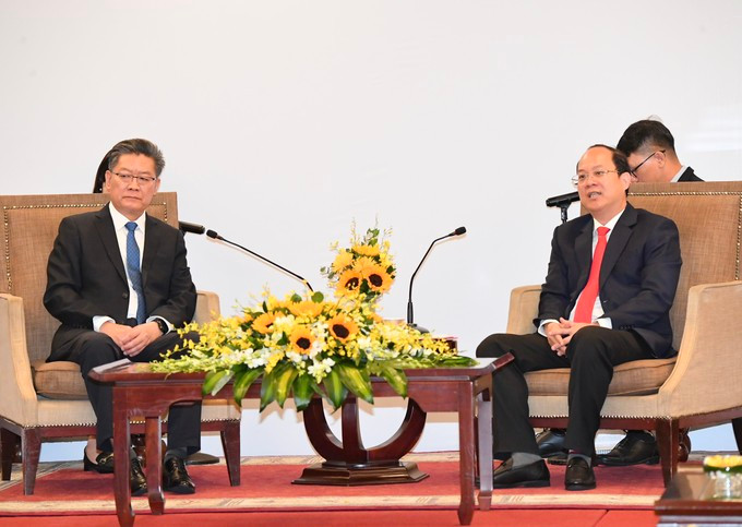 El subsecretario del Comité del Partido Comunista de Vietnam en Ciudad Ho Chi Minh, Nguyen Ho Hai, y el secretario del Comité partidista de China en Guangzhou, Guo Yonghang (Foto: sggp.org.vn)